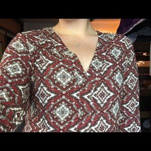 a red-patterned dress, size 10, from h&m